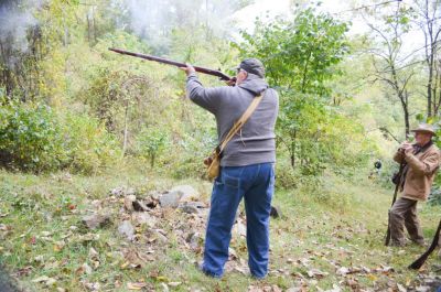 Up Hill All THe Way
Not only is John shooting up hill, we walked up hill for the twenty targets and dodged cow patties strategically placed to simulate mine fields.
