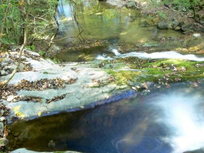 Whirly Gigs
The top of Joe Mill Falls Upper, and a little time exposure with my handy dandy Panasonic FZ-30 brings out some whirlpools, both ab ove and below the falls.
